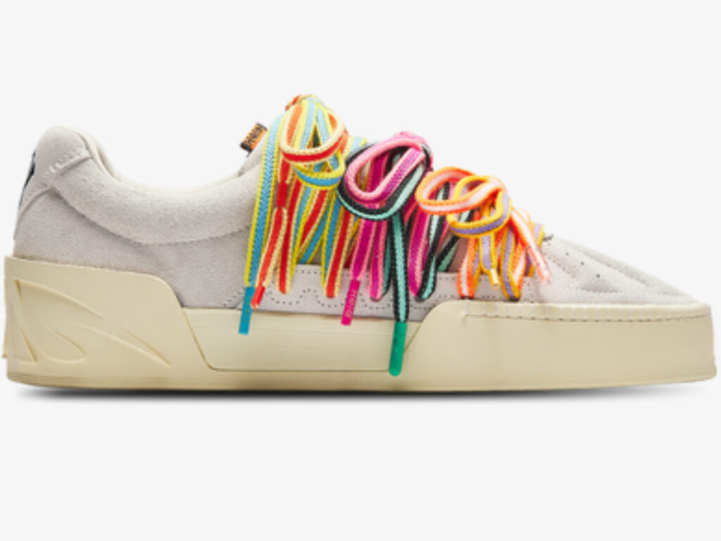 Anta Hela Roots sneakers showcased at Foot Locker, featuring earth-toned design inspired by natural strength and movement