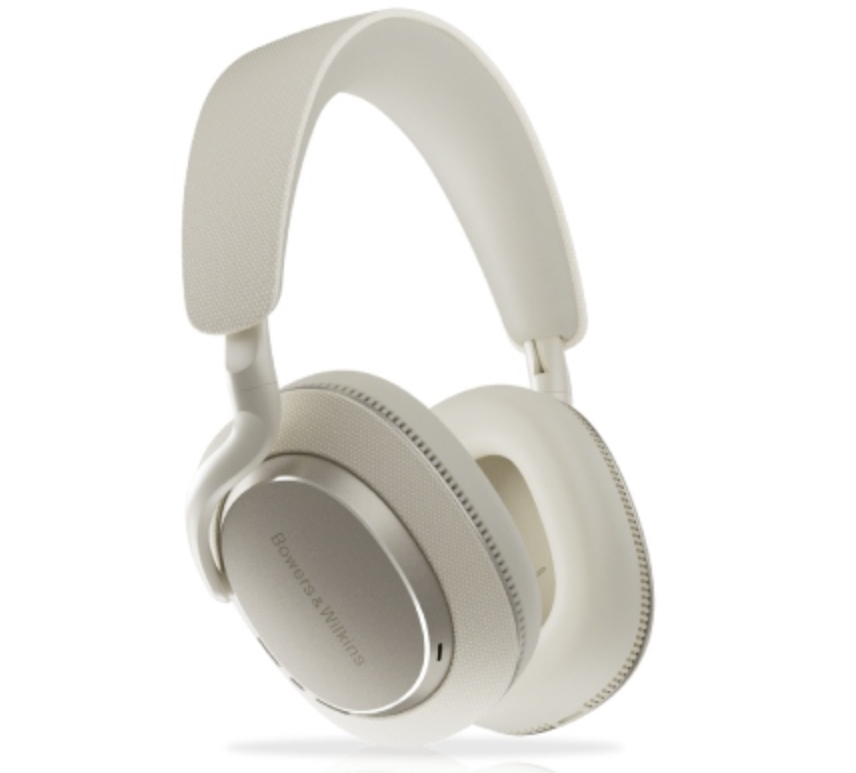 Bowers & Wilkins Px7 S3 wireless over-ear headphones in Ocean Blue displayed on a marble table with soft lighting