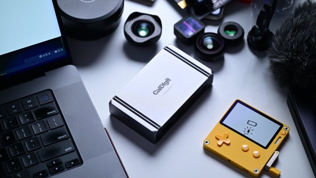 CalDigit Element 5 Hub showcasing Thunderbolt 5 ports and compact aluminum design on a professional workspace desk