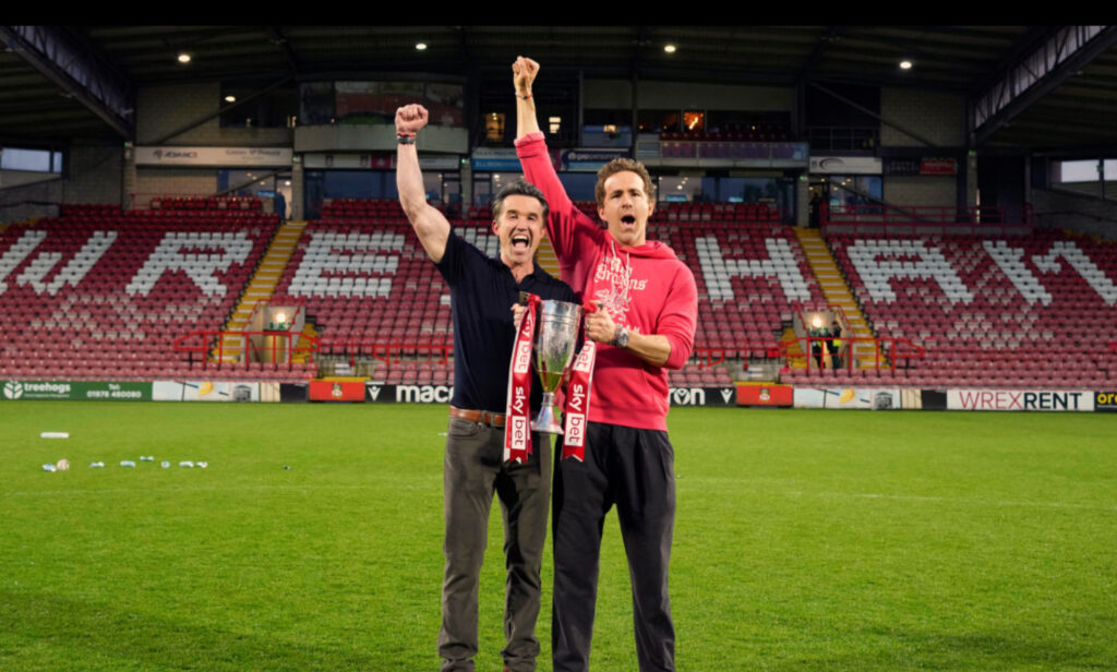 Ryan Reynolds and Rob McElhenney celebrate Wrexham AFC’s historic third promotion, reaching the English Championship in 2025