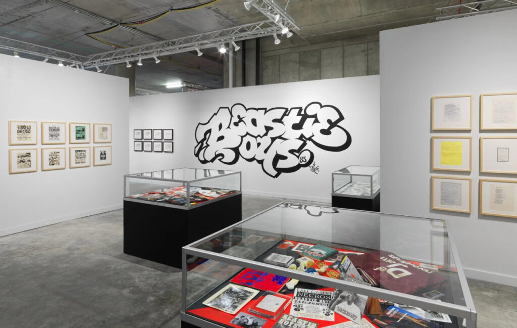 Photograph by Dan Bradica of the Beastie Boys installation at Beyond The Streets New York 2019, featuring ephemera and gear
