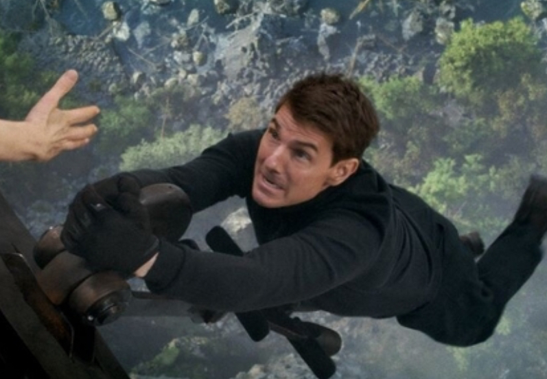 Tom Cruise performing a high-altitude stunt in Mission: Impossible – The Final Reckoning