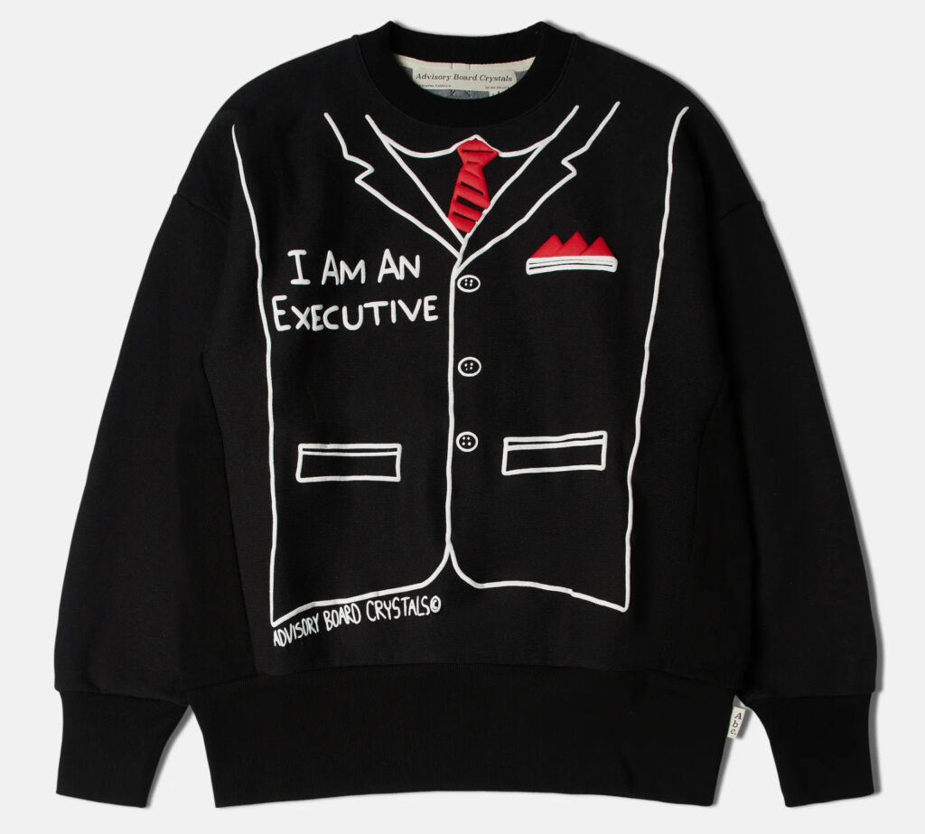 Front view of black ABC. sweatshirt featuring “I Am An Executive” slogan in clean white lettering across the chest