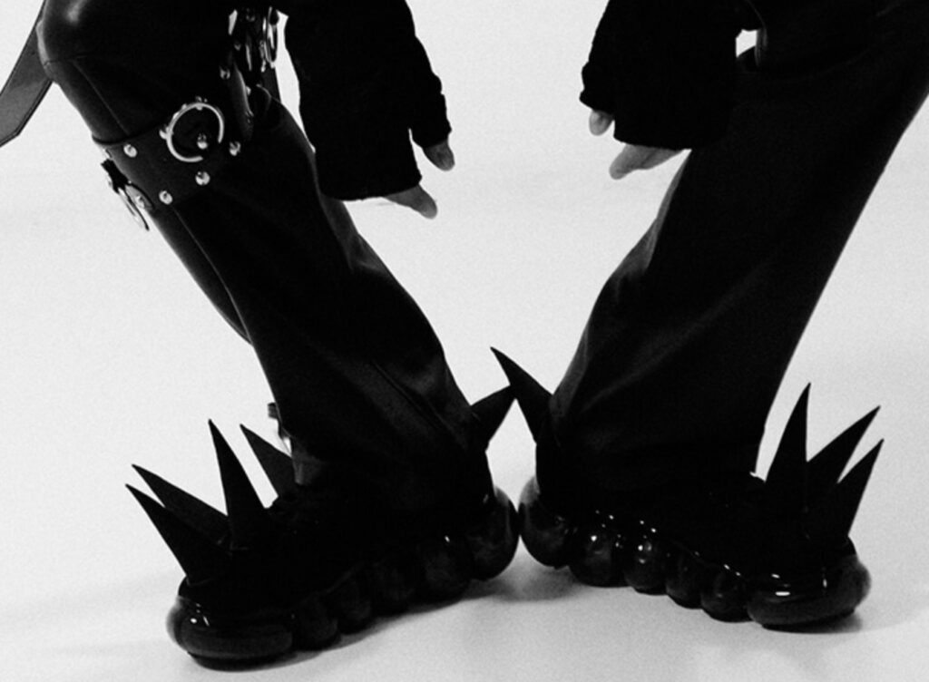All-black Grounds x H. Lorenzo Spike Shoes displayed for 40th anniversary celebration, featuring sharp, sculptural design