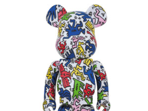 Medicom Toy BE@RBRICK featuring Keith Haring’s colorful dancing people design on a white vinyl bear-shaped figure