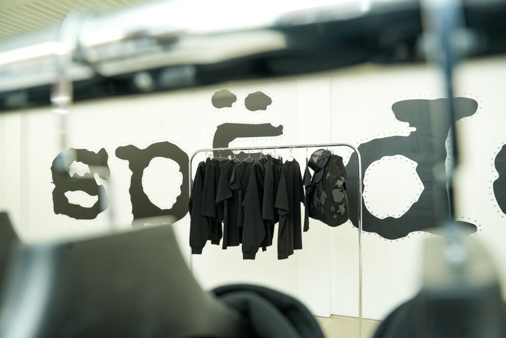 Crowds line up outside SP5DER’s NYC pop-up store on 5/5/25 for the exclusive Phantom Stones fashion drop