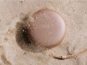 Bang & Olufsen Beosound A1 3rd Gen portable speaker in eucalyptus green with leather strap and aluminum finish