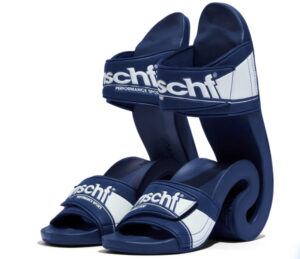 MSCHF PERFORMANCE SPORT slide sandals featuring exaggerated spiral soles and bold navy-and-white branding on thick straps
