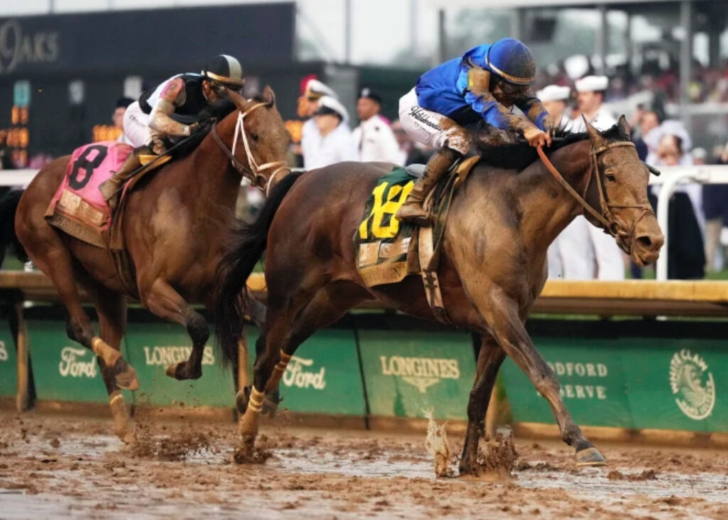 Sovereignty galloping across the Churchill Downs finish line with jockey Junior Alvarado after winning the 2025 Kentucky Derby