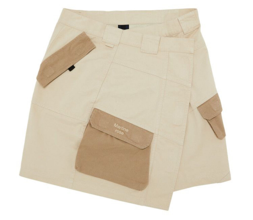 Martine Rose beige wrap cargo skirt with oversized pockets and adjustable waist, displayed against a neutral backdrop