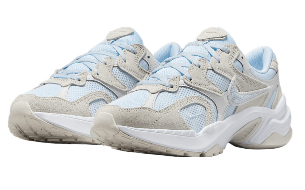 Nike AL8 women’s shoe in Blue Tint and Summit White, featuring mesh upper and soft foam sole on a clean background