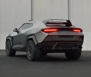 Rezvani Knight armored SUV parked in urban nightscape, with angular carbon fiber panels and glowing LED lights