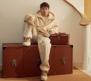 Charles Leclerc models Ferrari limited-edition fashion capsule with Rocco Iannone, featuring petwear