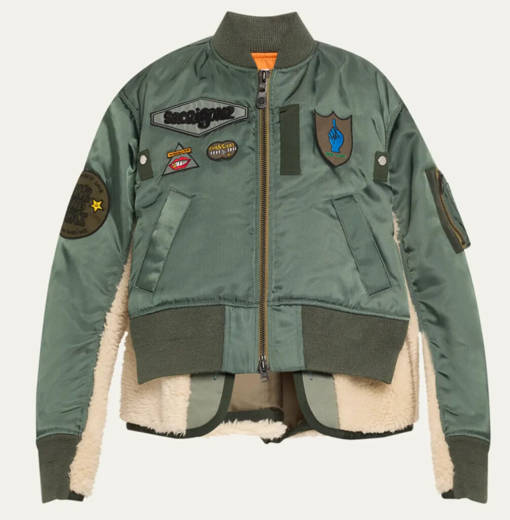 Sacai x Spiewak Patch Nylon Shearling Jacket featuring military green nylon, shearling collar, and modular patchwork design