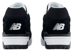 Side profile of the New Balance 550 Black/White sneaker showing its clean, minimal black-and-white color blocking