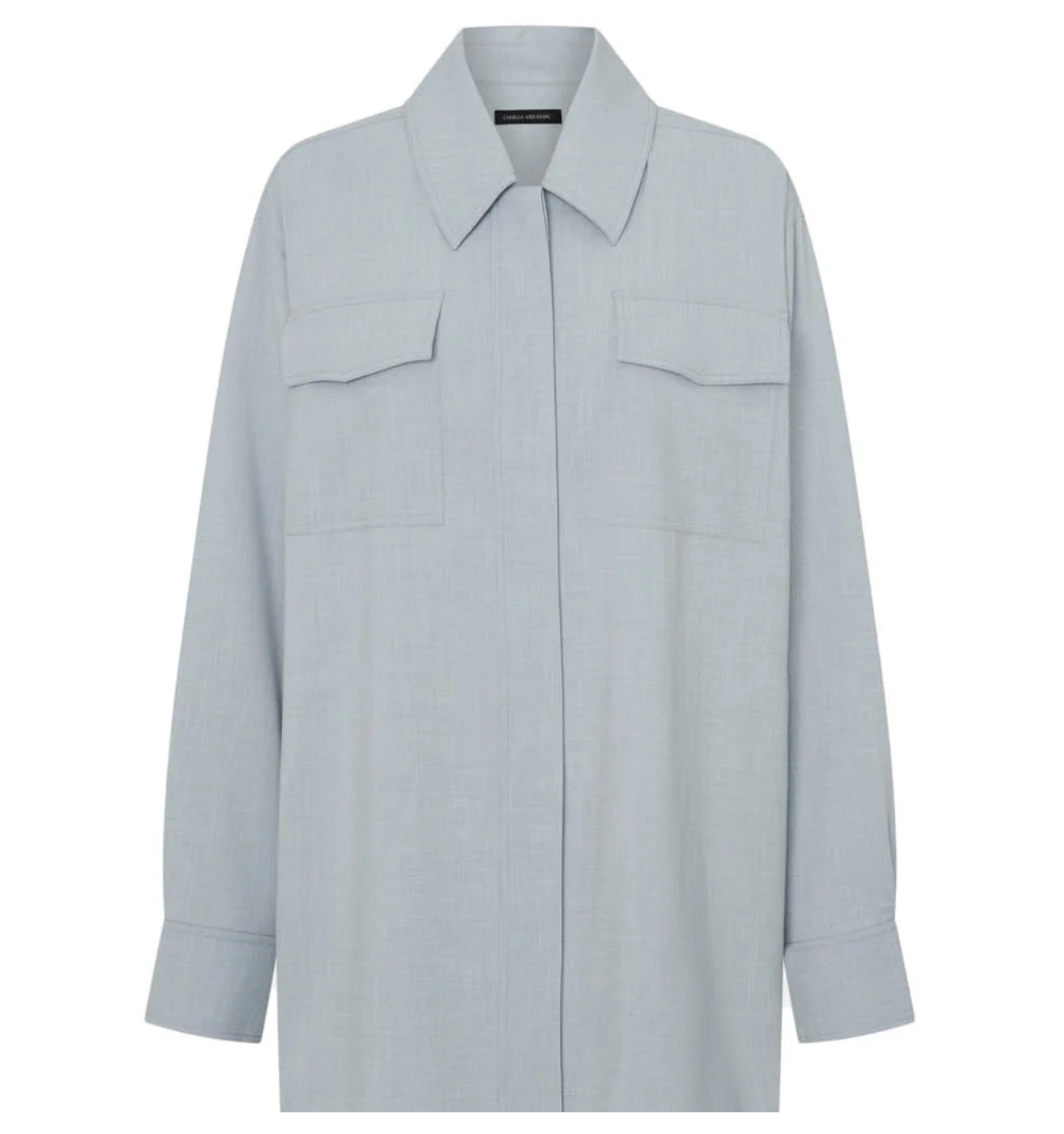 CAMILLA AND MARC Nevis Over Shirt in Dusk Blue, showcasing front pockets and curved hem design