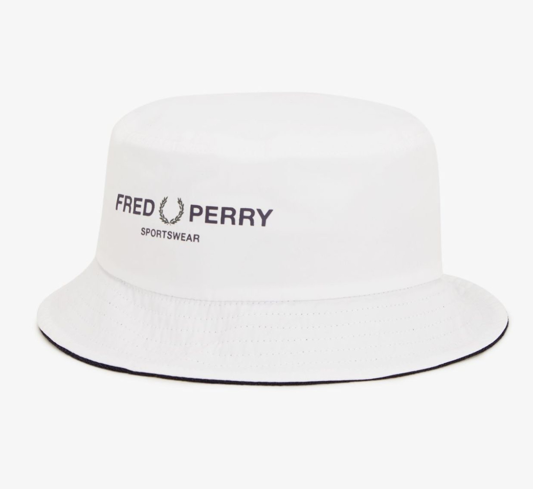 Fred Perry Sportswear Bucket Hat in navy with embroidered laurel wreath logo, breathable eyelets, and structured brim