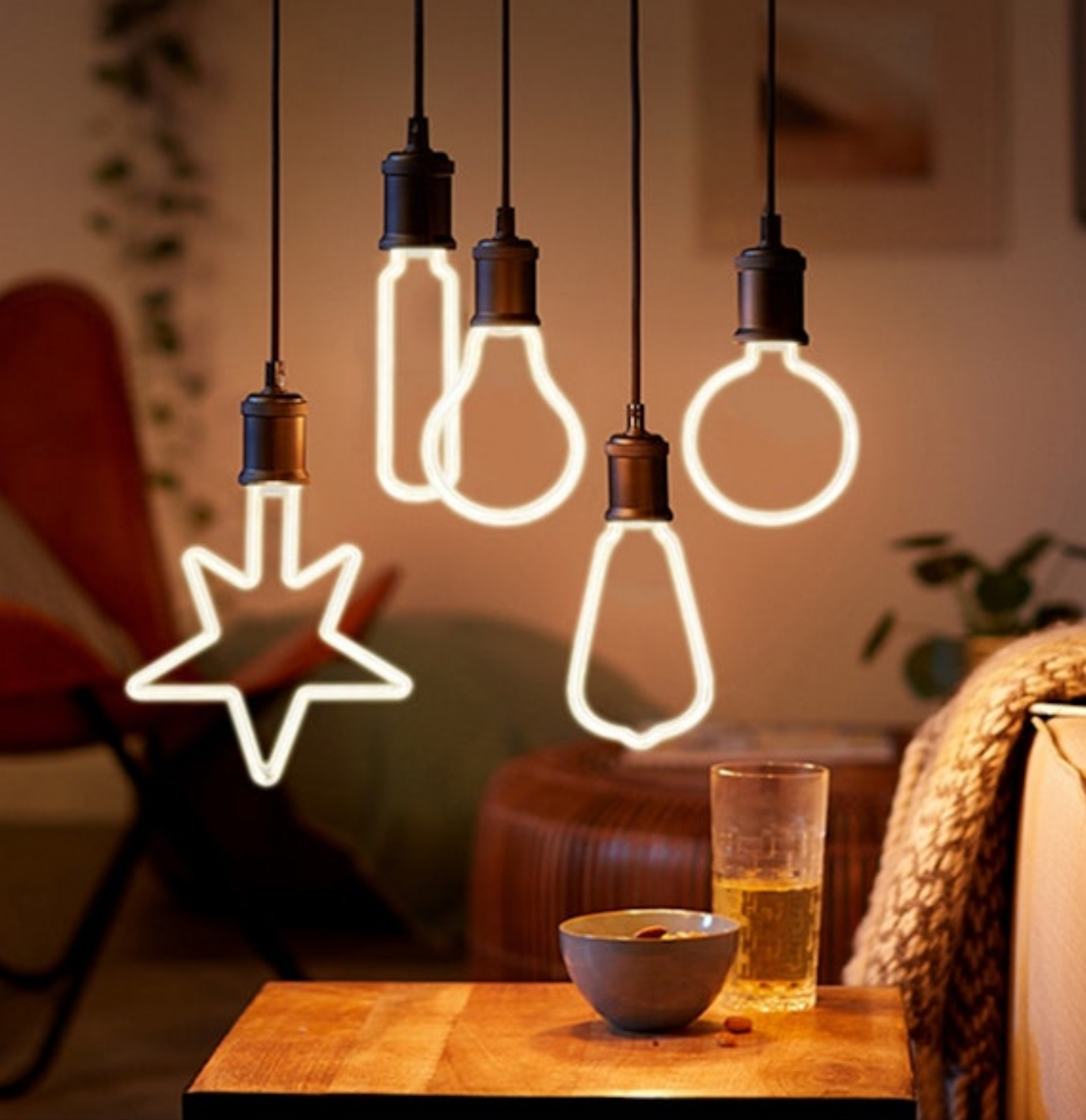 LED Abstract Edison Bulb with twisted filament glowing inside vintage-style glass globe