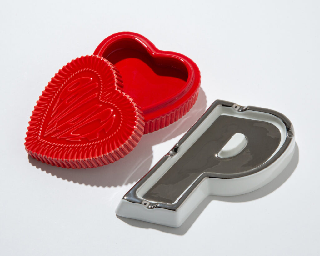 PALACE Skateboards ceramic trinket box and ashtray styled in a home interior, showcasing bold logo and heart design