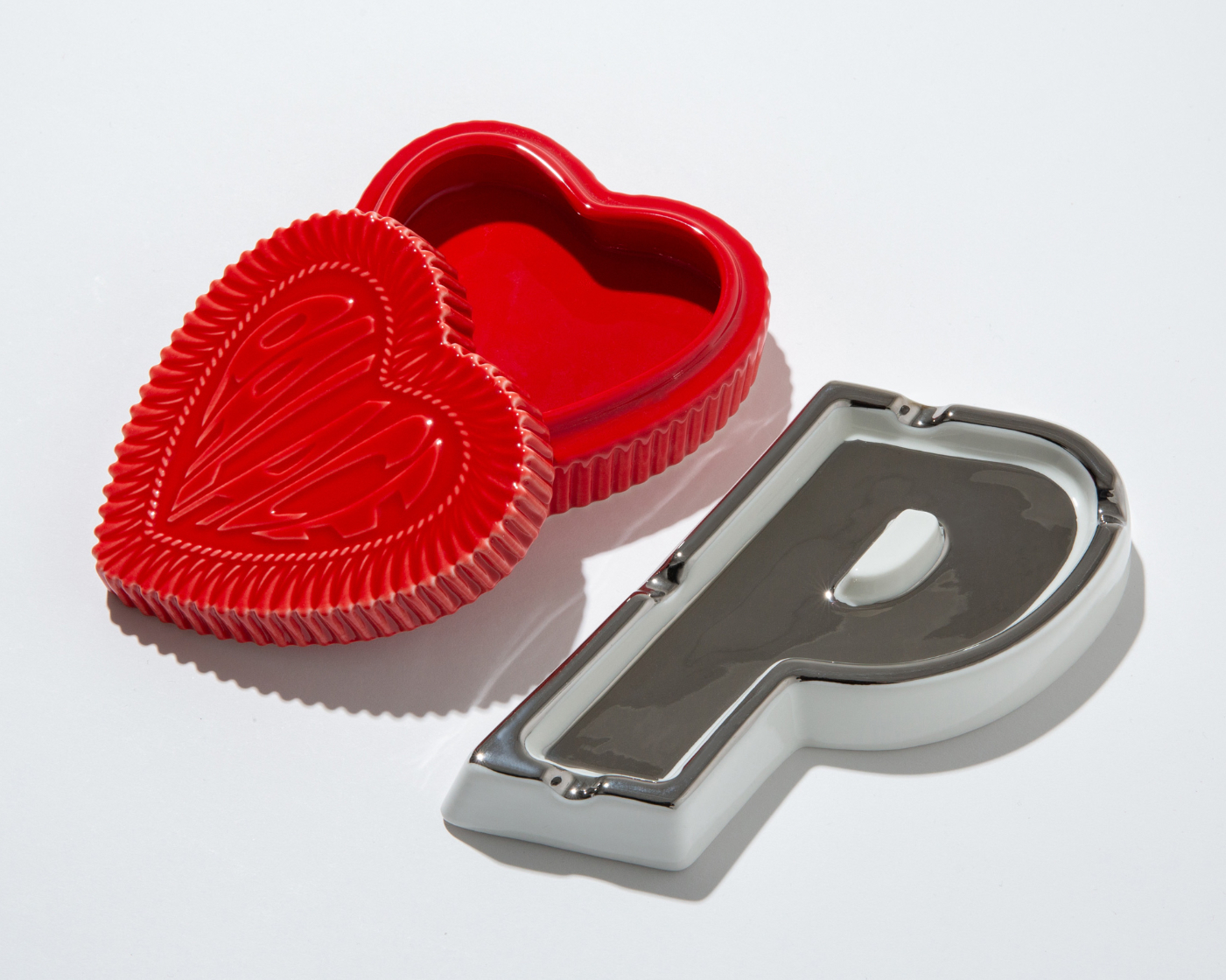 PALACE Skateboards ceramic trinket box and ashtray styled in a home interior, showcasing bold logo and heart design