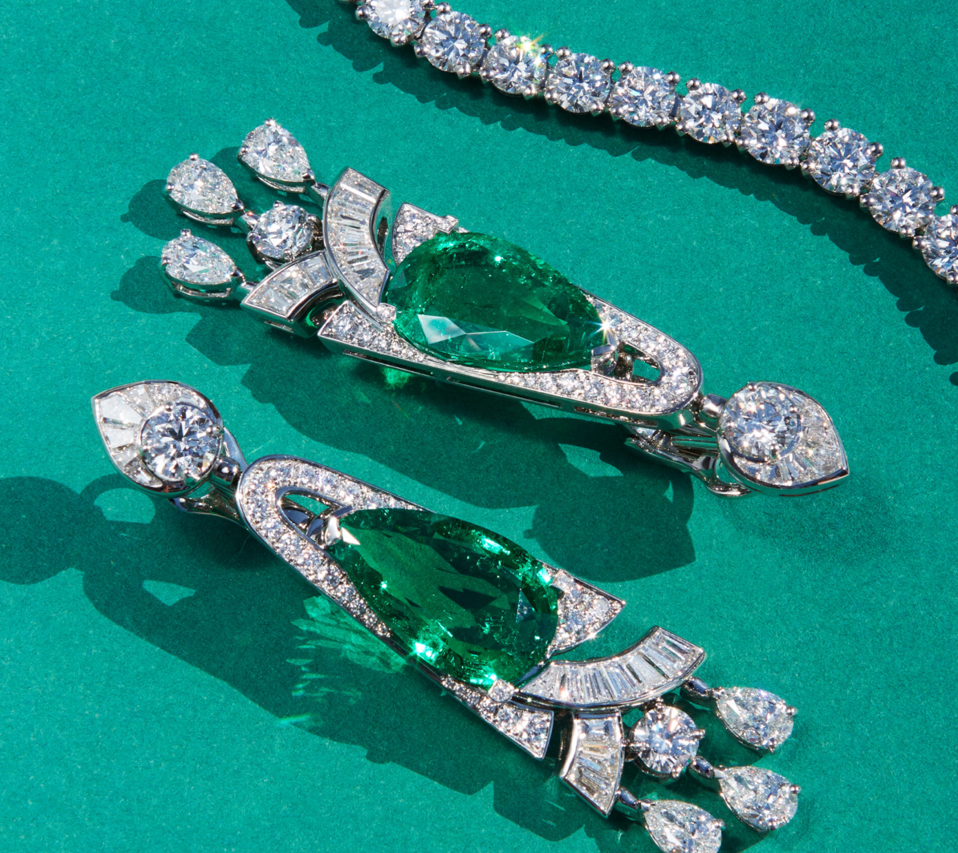Bvlgari High Jewellery necklace with 241ct emerald and matching emerald-diamond earrings, both in platinum