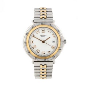 Close-up of Hermès Captain Nemo ladies watch with gold and steel bracelet, Roman numeral dial, and unidirectional bezel