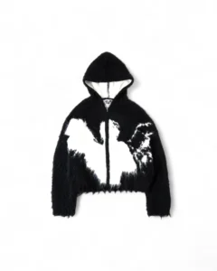 WHATHAPPENEDTOGOD “ANGEL” mohair zip in black, its fibers haloed by light, evoking celestial defiance.