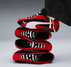 PUMA Speedcat Plus Unisex Shoe in Shadow Black with Graphite Grey details, showing low-profile silhouette and race-inspired sole