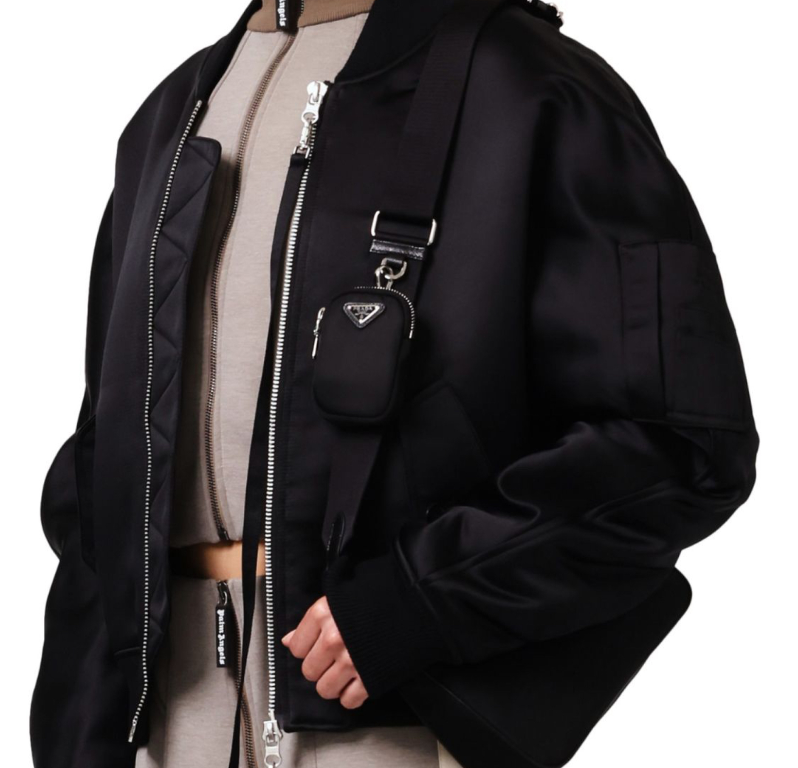 The Prada Black Messenger Bag: Function as Fashion, Minimalism as Power