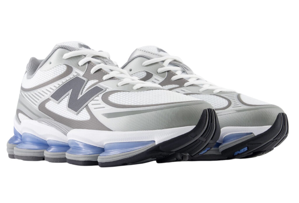 Side view of the New Balance ABZORB 2000 Grey sneaker showcasing its layered grey upper and ABZORB cushioned sole