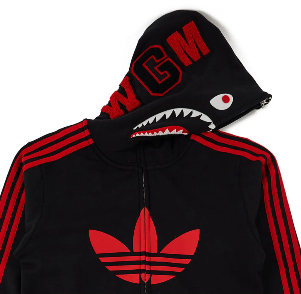 Full-body view of the BAPE® x adidas Shark Full-Zip Hoodie in black, showing shark embroidery and adidas three-stripe detailing