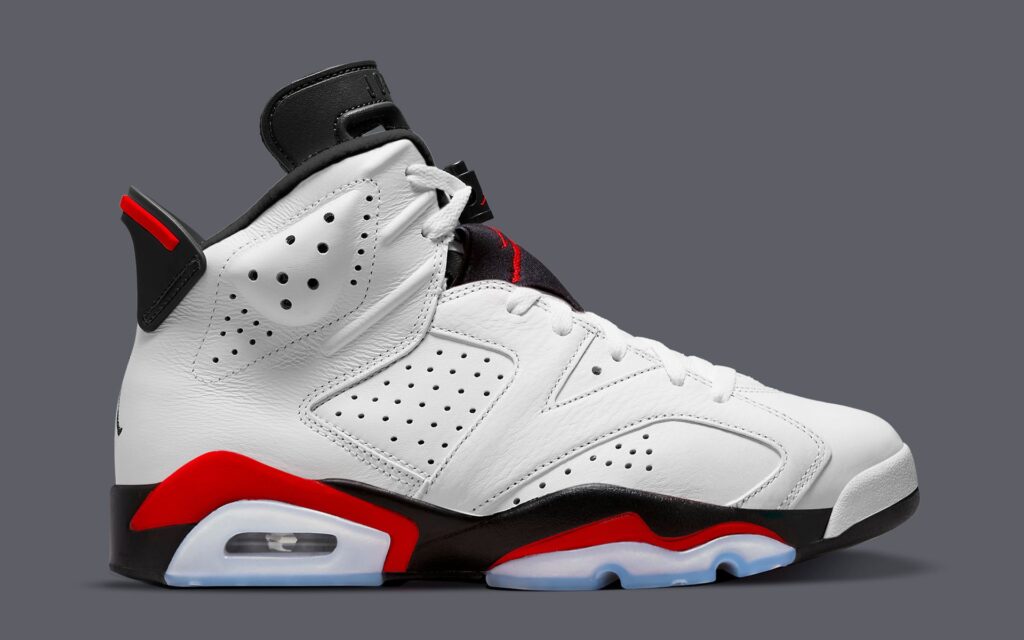 Nike Air Jordan 6 “White/Fire Red” sneaker featuring white leather, red accents, and black details