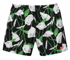 Supreme SS18 black nylon water trunks featuring tonal floral pattern, unisex fit, and minimalist streetwear design