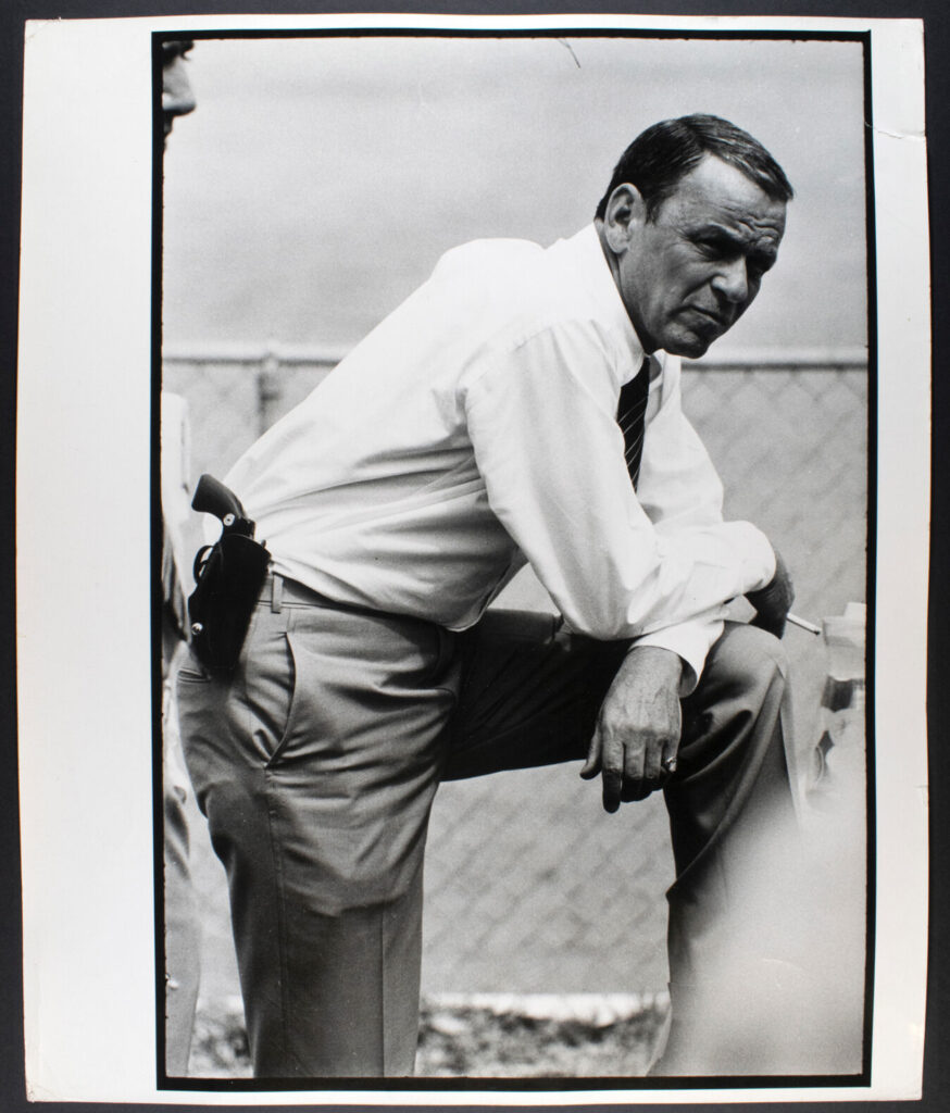 Terry O’Neill’s original 1968 vintage photograph of Frank Sinatra walking on set in Miami during filming of The Lady in Cement
