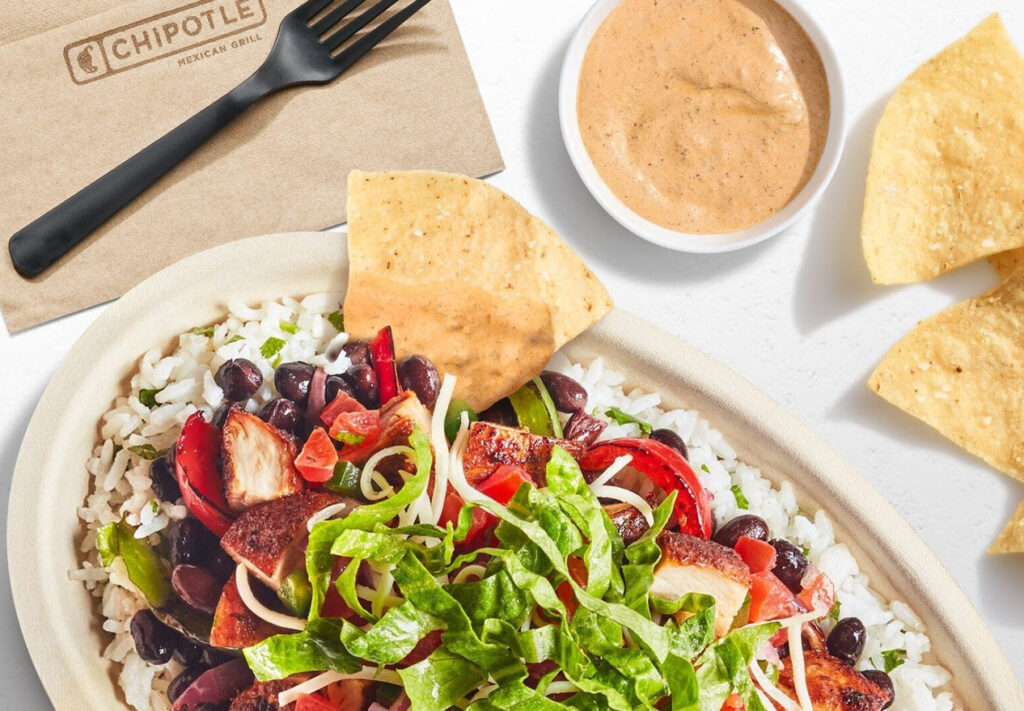 Chipotle Adobo Ranch Dip in a side cup with burrito bowl, creamy ranch with smoky adobo flavor