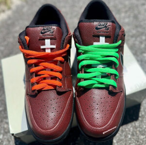 Limousine Skateboards x Nike SB Dunk Low shoe in black and crimson satin with suede overlays and padded tongue