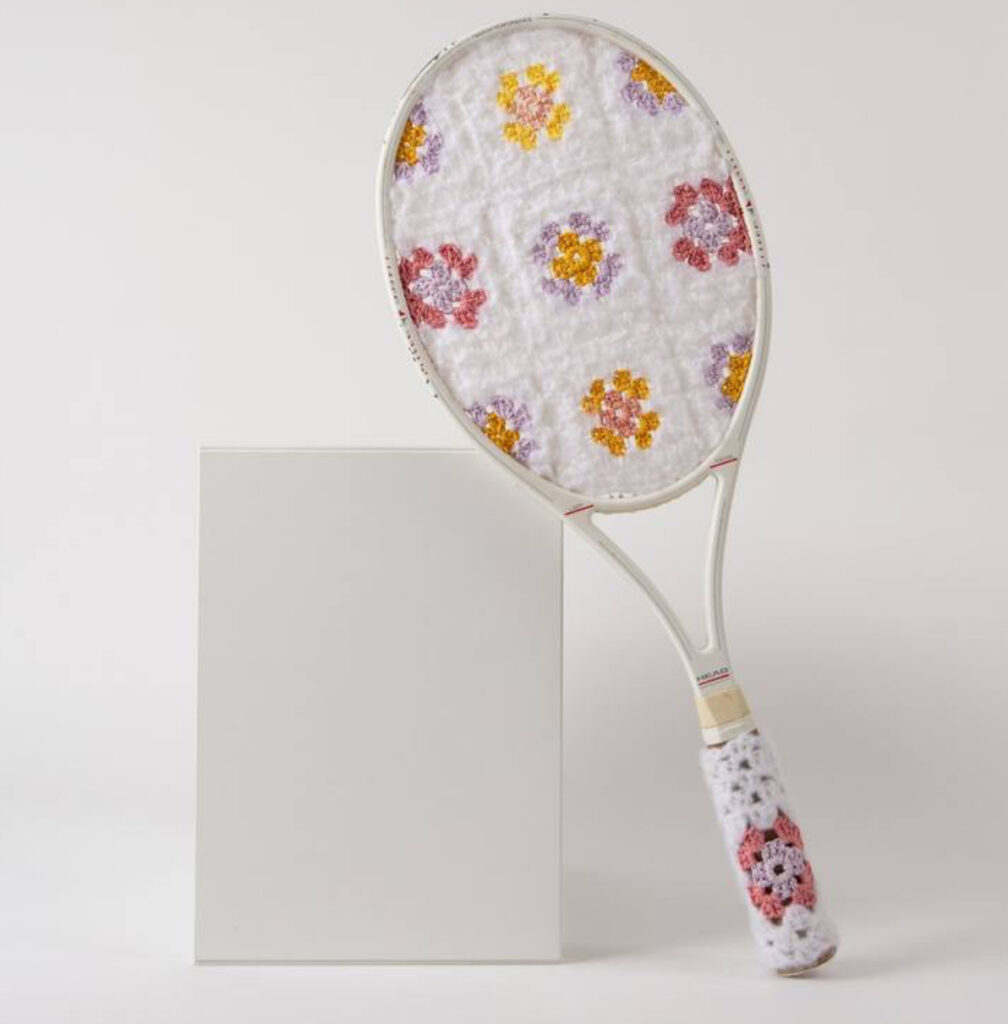White crochet and plastic sculpture by Sophie Inard titled Jeu Double en Blanc, composed of twin organic forms in soft symmetry