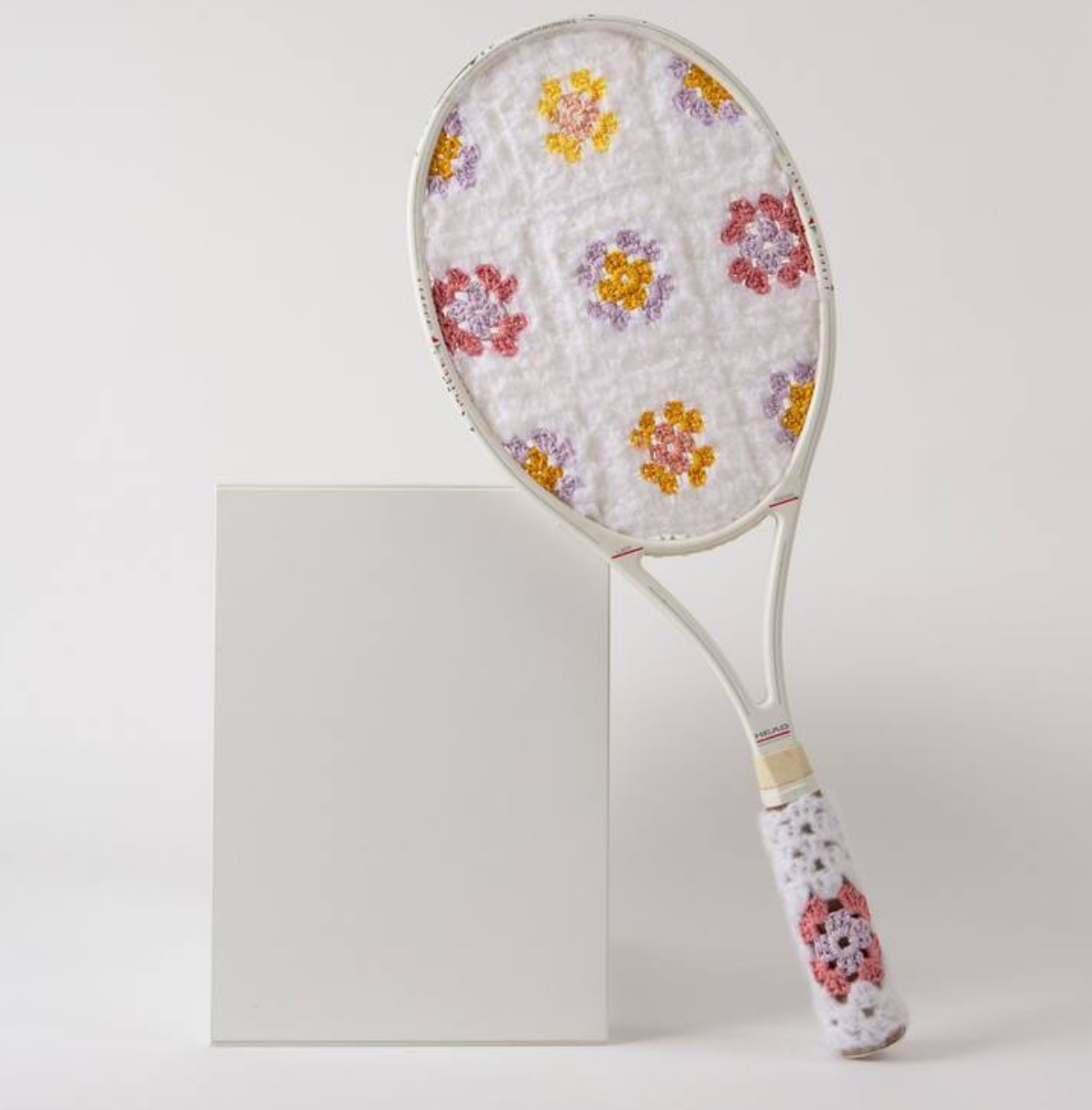 White crochet and plastic sculpture by Sophie Inard titled Jeu Double en Blanc, composed of twin organic forms in soft symmetry