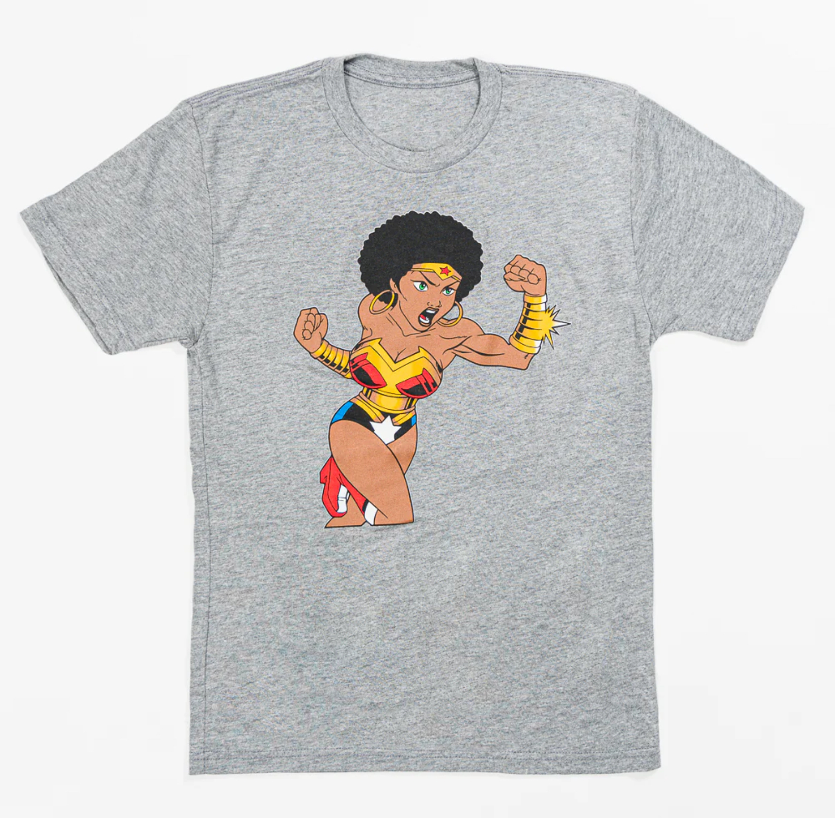 HARLEMUNDERGROUND Wonder Woman Tee featuring a Black superheroine in afro and armor, styled against a Harlem storefront backdrop
