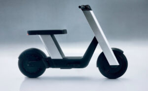 Infinite Machine Olto e-bike with aluminum frame, square seat, modular accessories, and hidden footpegs