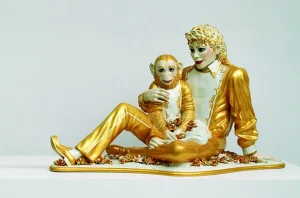 Jeff Koons' sculpture "Michael Jackson and Bubbles" featuring gilded porcelain figures of Michael Jackson and his pet chimpanzee