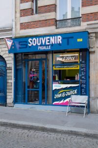 exterior of Souvenir Pigalle store at 17 Rue Duperré, Paris, featuring pastel colors, elephant mascot, and skittish design elements