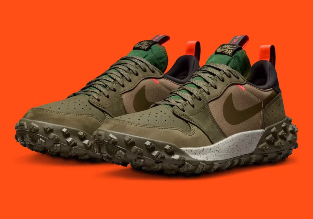 Air Jordan 1 Element Low “Medium Olive” shoe with ballistic nylon base, suede overlays, taped Swoosh, and studded outsole for all-weather traction.