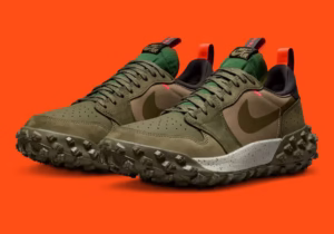 Air Jordan 1 Element Low “Medium Olive” shoe with ballistic nylon base, suede overlays, taped Swoosh, and studded outsole for all-weather traction.