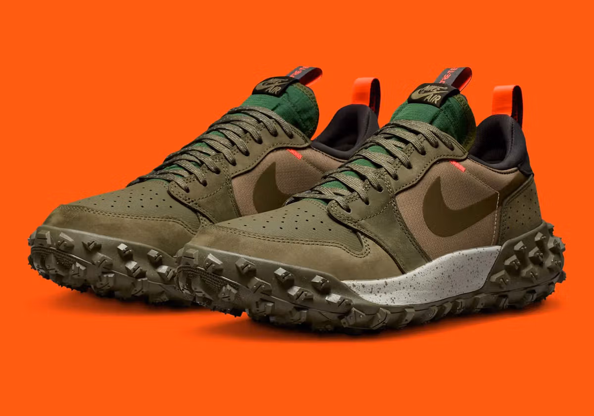 Air Jordan 1 Element Low “Medium Olive” shoe with ballistic nylon base, suede overlays, taped Swoosh, and studded outsole for all-weather traction.