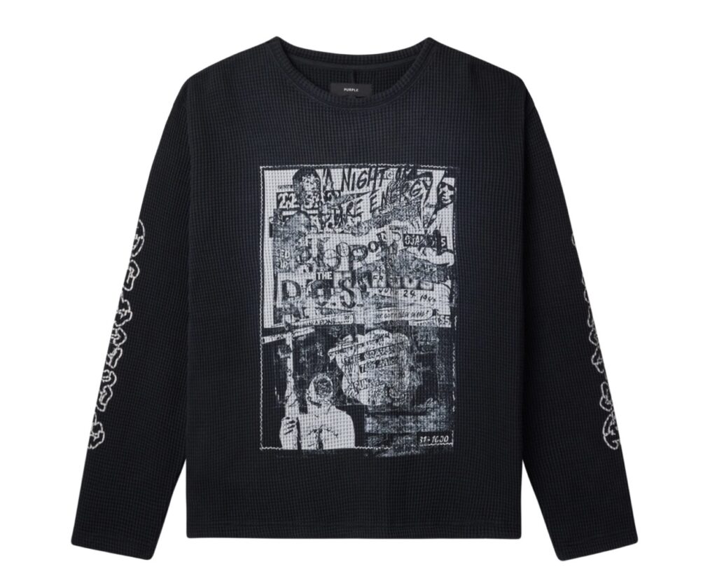 New Wave Waffle Knit Shirt by Purple in black, featuring a distressed collage-style graphic on the chest and bold white typography running down both sleeves.