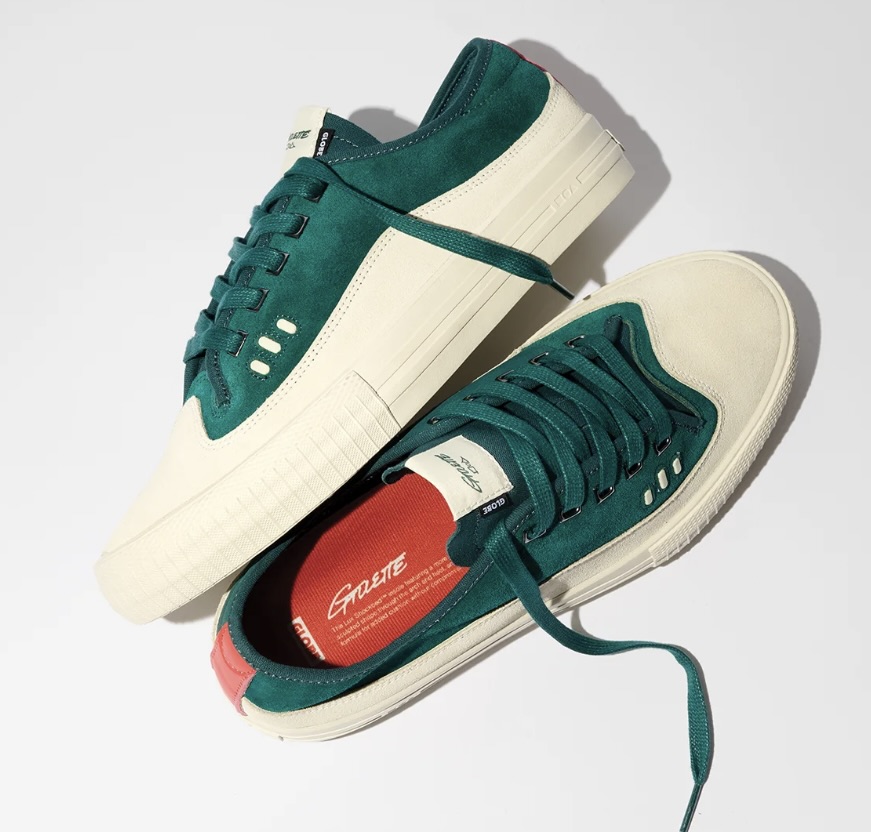 Close-up of Globe Gillette Moss/Cream sneakers highlighting suede upper and cream outsole.