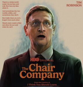 Promotional poster for HBO’s The Chair Company featuring Tim Robinson in a suit, looking shocked with a bandage on his forehead, text describing the show’s premise, and HBO Original branding.