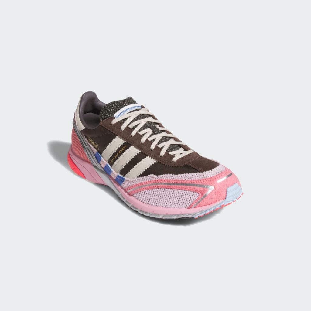 Bad Bunny x adidas Adizero SL 72 “Nostalgic Trio” shoe featuring brown suede overlays, cream three stripes, pink mesh base, and retro-inspired detailing.
