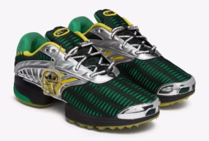 Image of the Brain Dead x adidas Climacool 2 sneaker in “Signal Green” colorway, photographed on a textured grey backdrop. The shoe features a ventilated mesh upper, sculpted TPU side ribs, and layered midsole vents. Brain Dead’s brain logo appears on the heel tab, while adidas’ three stripes are subtly integrated into the mesh structure. The design merges early-2000s tech aesthetics with Brain Dead’s experimental streetwear sensibility.